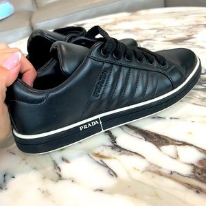Black Prada tennis sneakers gently worn